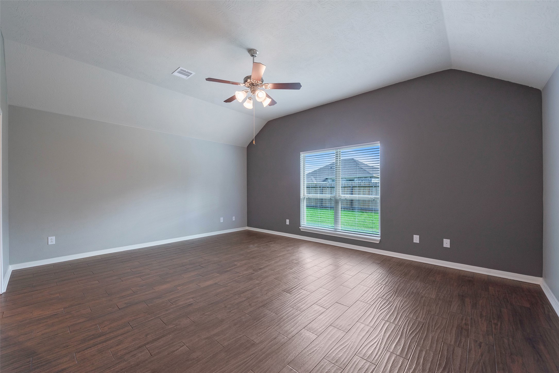 3705 Cabo Road League City, TX 77573 - Photo 16 of 43 wooden floor in an empty room with a window