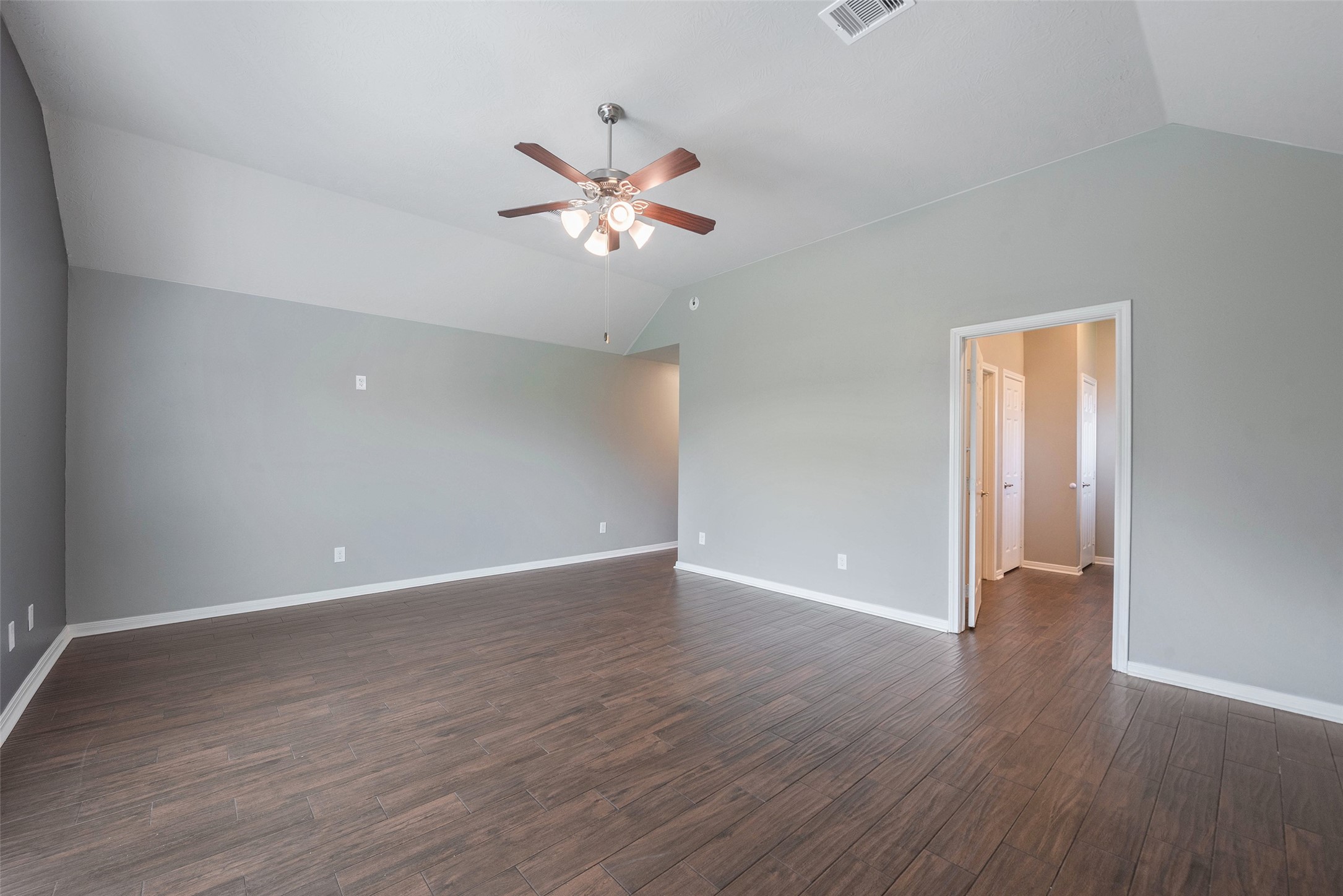 3705 Cabo Road League City, TX 77573 - Photo 18 of 43 a view of an empty room with wooden floor