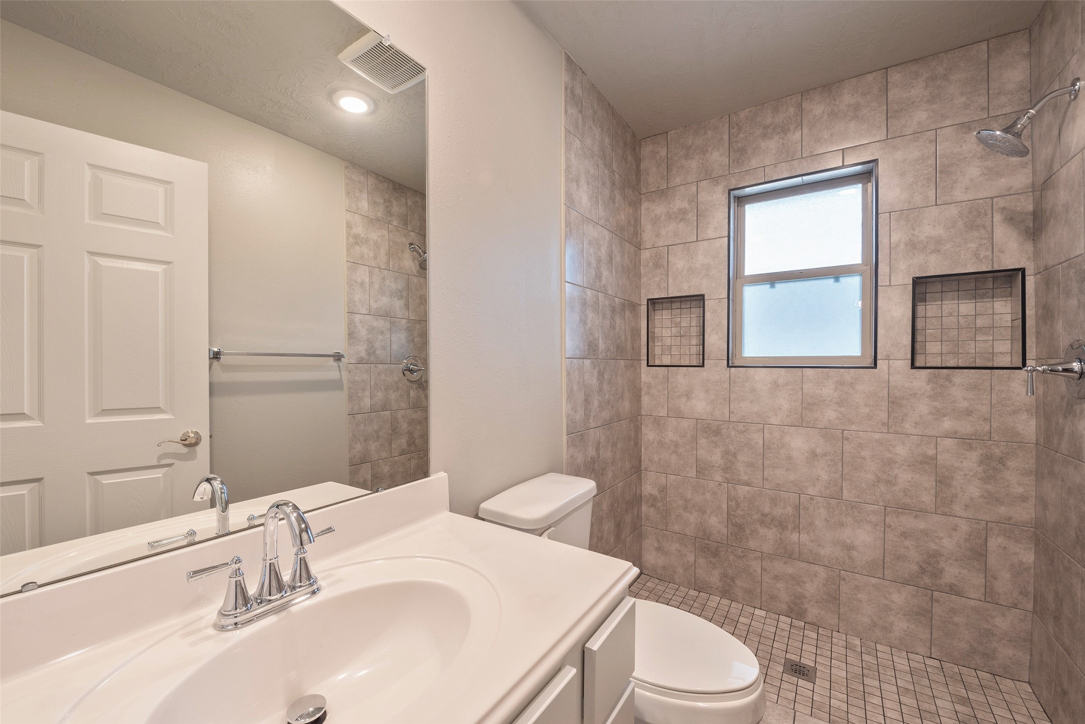 3705 Cabo Road League City, TX 77573 - Photo 24 of 43 a bathroom with a sink a toilet and shower