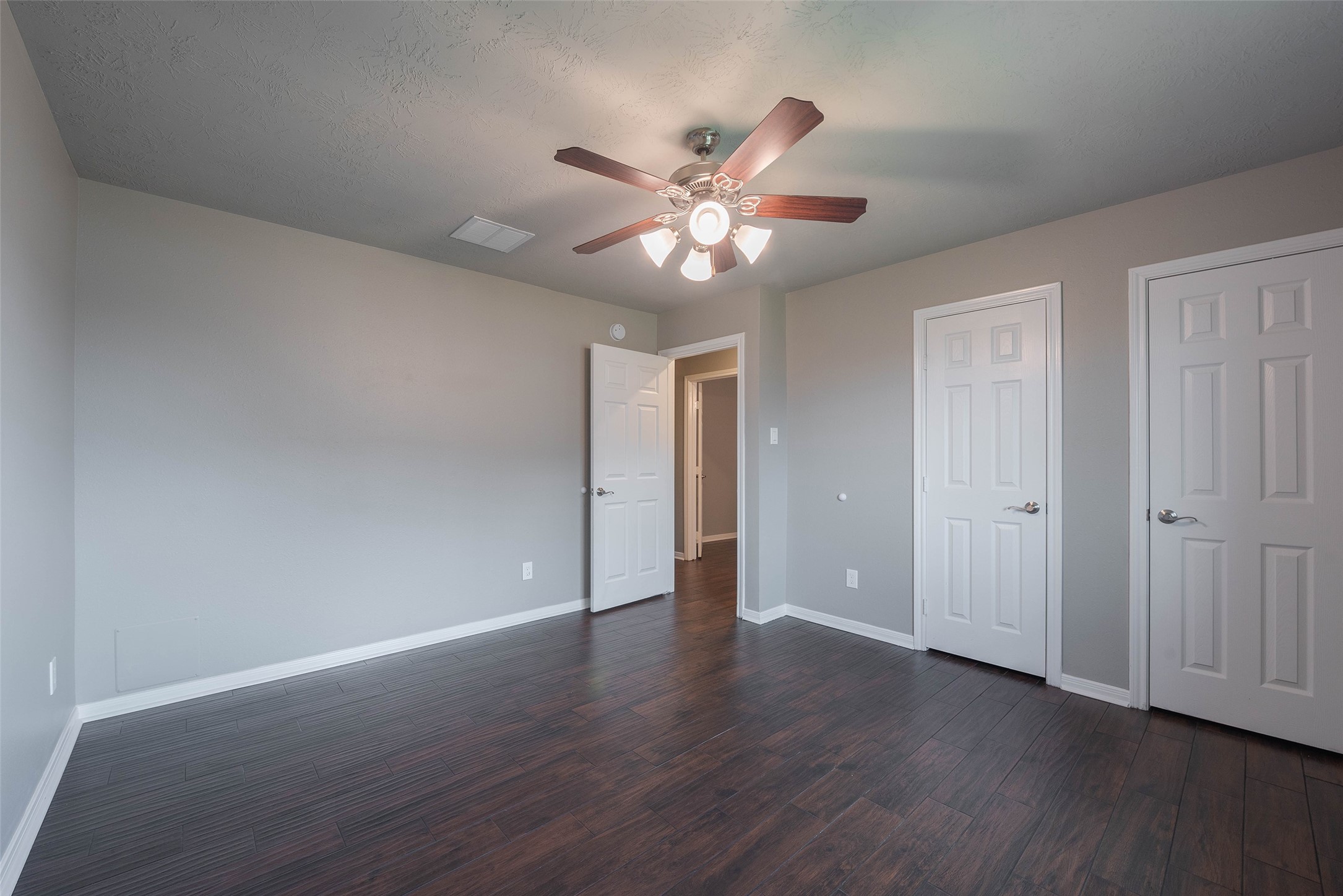3705 Cabo Road League City, TX 77573 - Photo 28 of 43 a view of an empty room with wooden floor