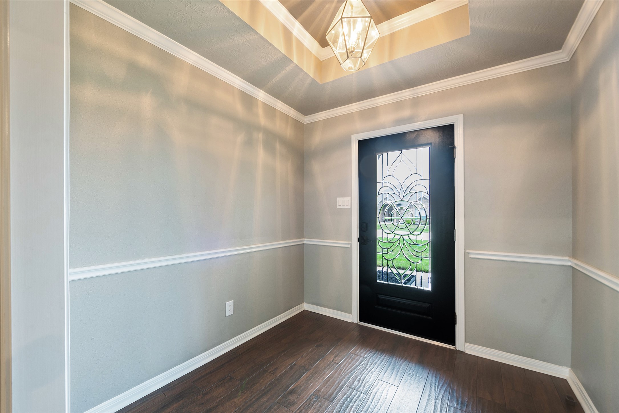3705 Cabo Road League City, TX 77573 - Photo 3 of 43 a view of an empty room with wooden floor and a window