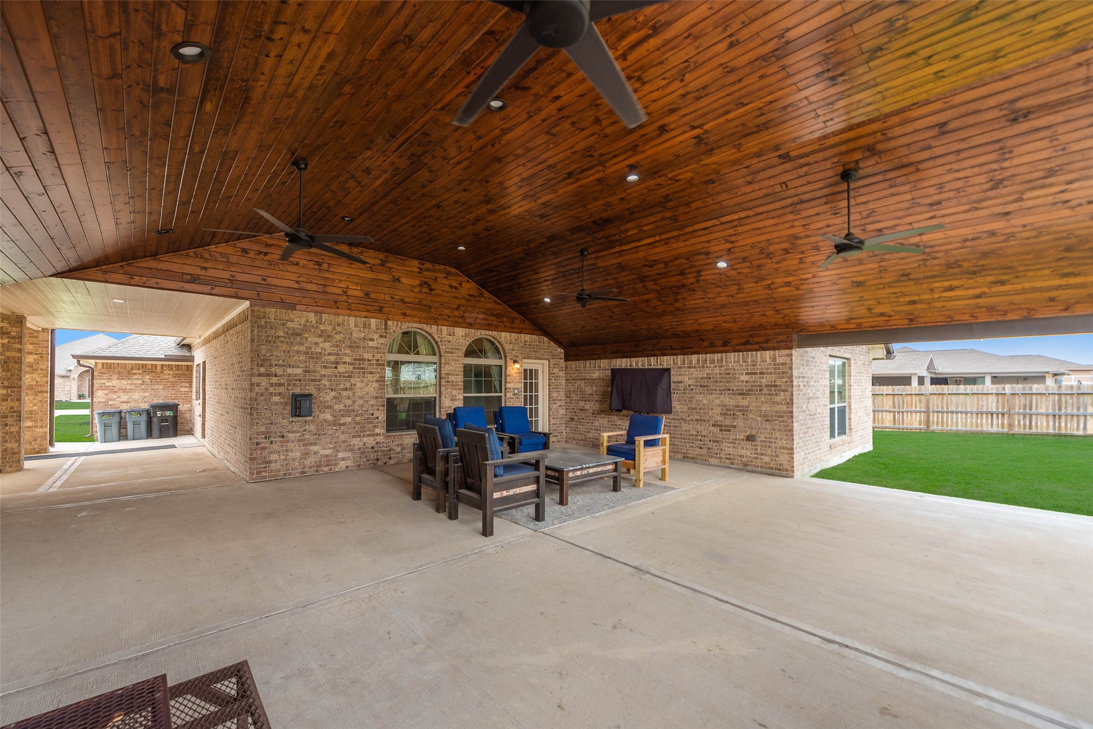 3705 Cabo Road League City, TX 77573 - Photo 32 of 43 a view of a patio with table and chairs and a barbeque