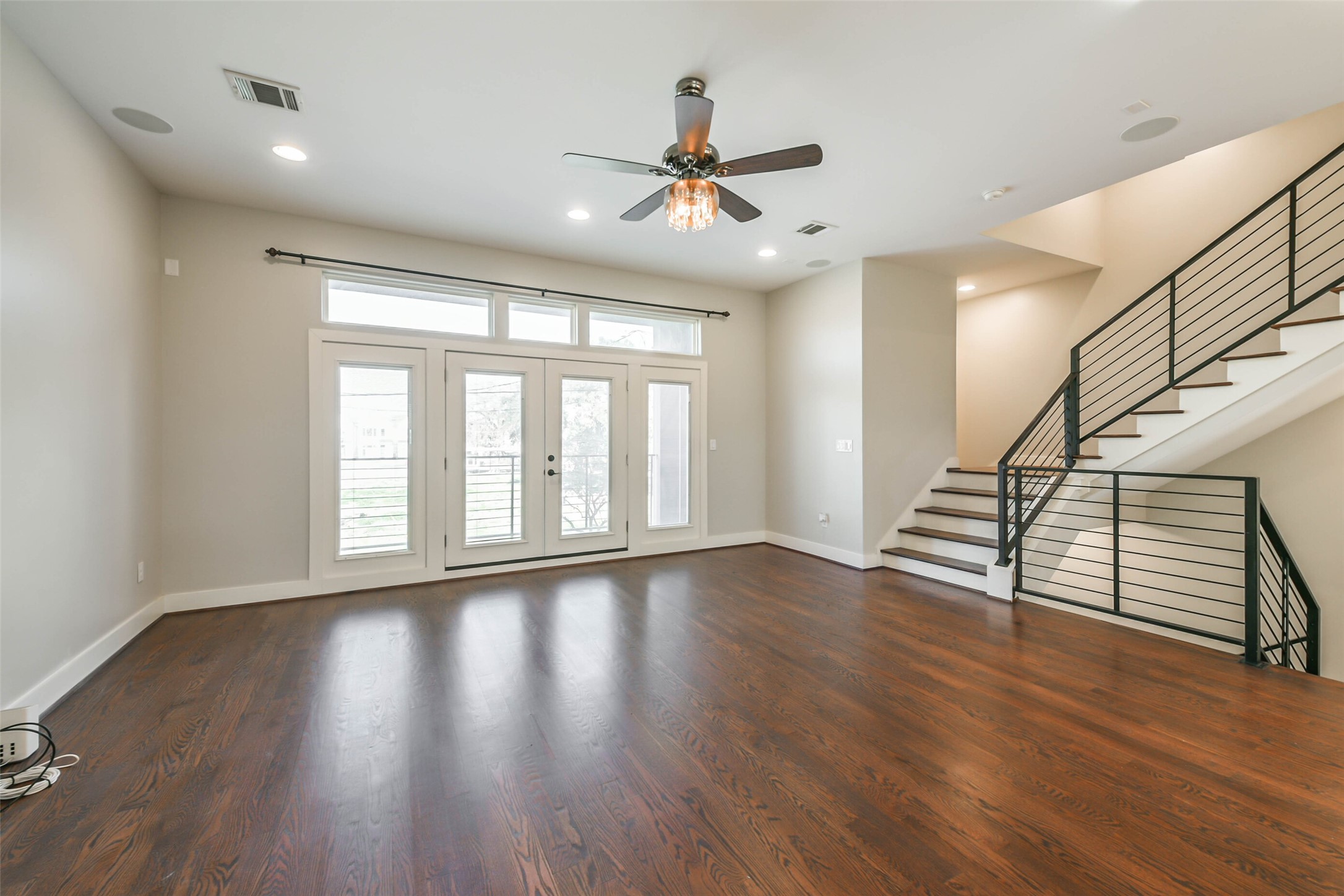 2422 Hadley Street Houston, TX 77004 - Photo 24 of 50 wooden floor in an empty room with a window