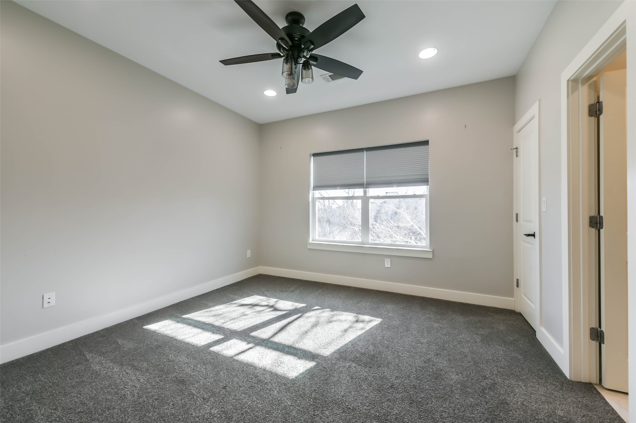 2422 Hadley Street Houston, TX 77004 - Photo 40 of 50 a view of room with window and ceiling fan