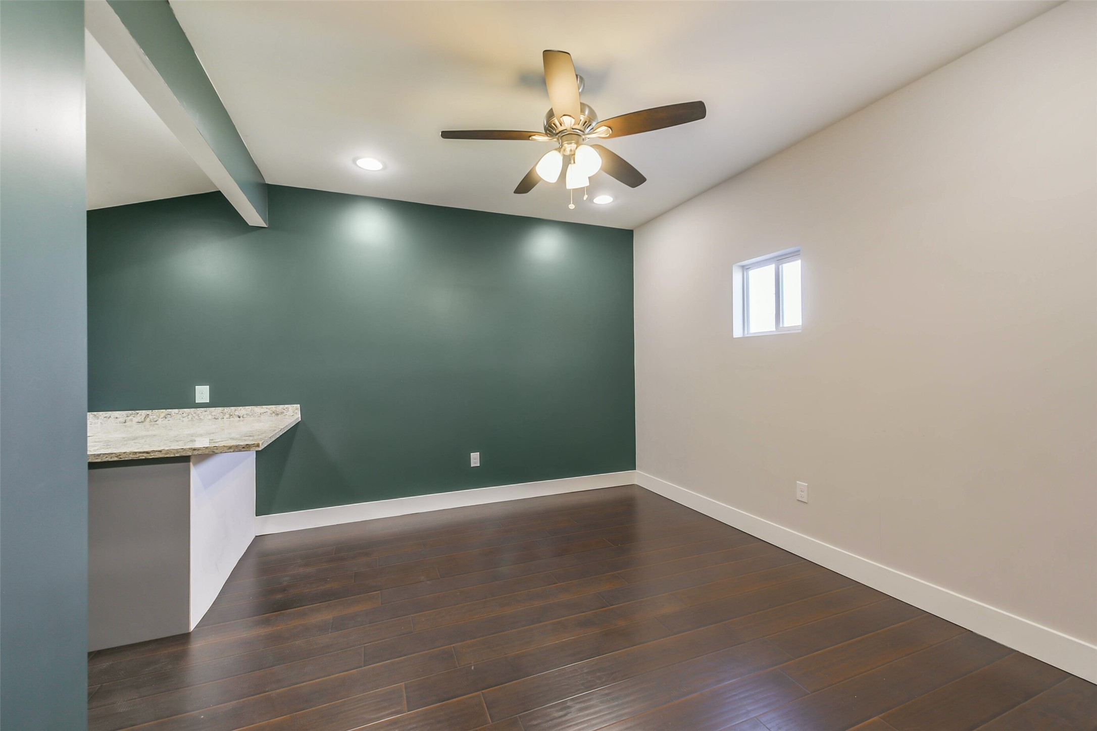 2422 Hadley Street Houston, TX 77004 - Photo 43 of 50 an empty room with wooden floor and fan
