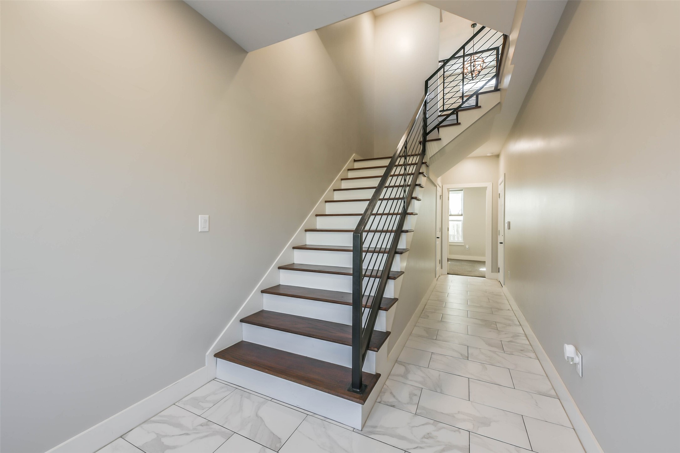 2422 Hadley Street Houston, TX 77004 - Photo 6 of 50 a view of entryway and hall with wooden floor