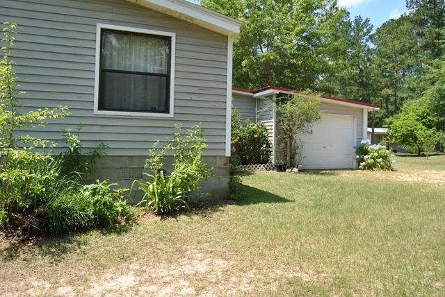 3361 Marshall Mill Road Byron, GA 31008 - Photo 4 of 7 a view of a backyard of the house