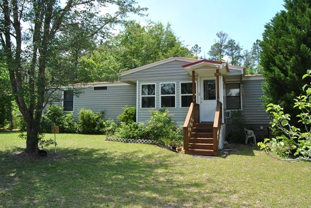 3361 Marshall Mill Road Byron, GA 31008 - Photo 7 of 7 a front view of a house with a yard