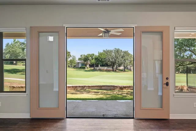 a view of a living room and front door