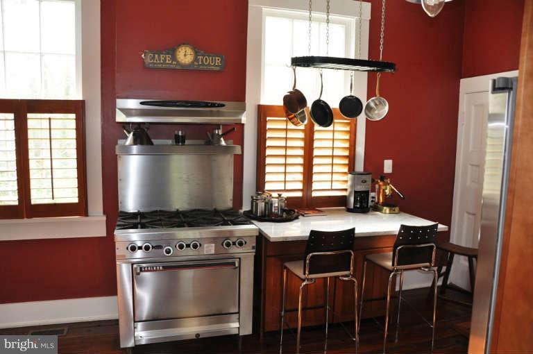 1708 Mansion Ridge Road Annapolis, MD 21401 - Photo 11 of 30 a stove top oven sitting inside of a kitchen