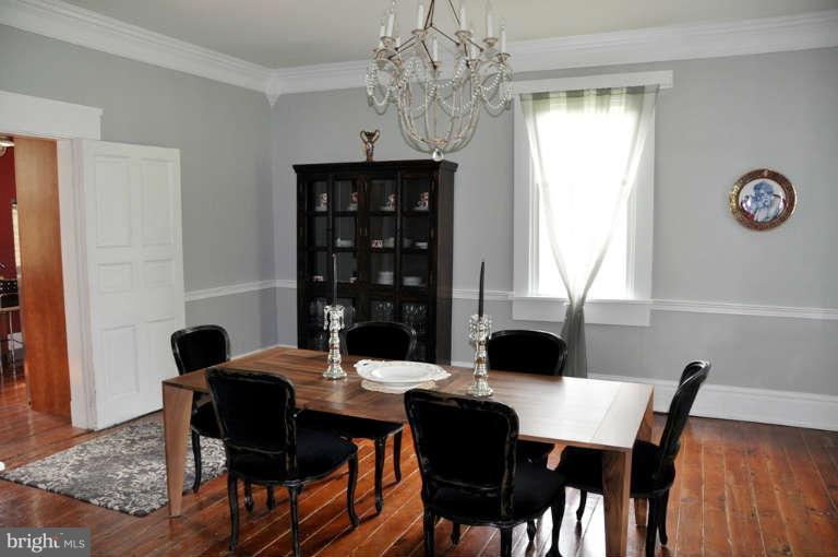 1708 Mansion Ridge Road Annapolis, MD 21401 - Photo 13 of 30 a view of a dining room with furniture and window