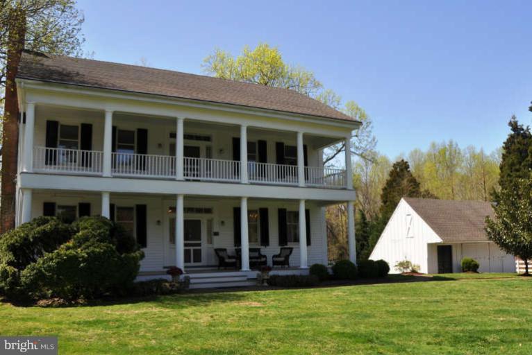 1708 Mansion Ridge Road Annapolis, MD 21401 - Photo 3 of 30 a front view of a house with a yard