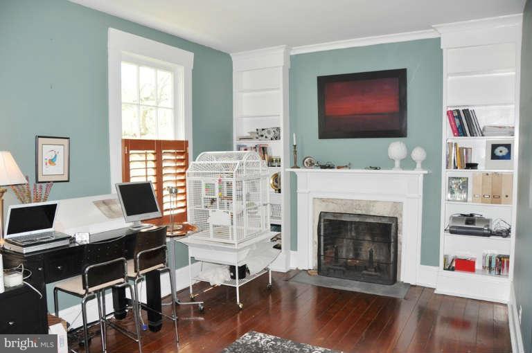 1708 Mansion Ridge Road Annapolis, MD 21401 - Photo 22 of 30 a living room with furniture fireplace and flat screen tv