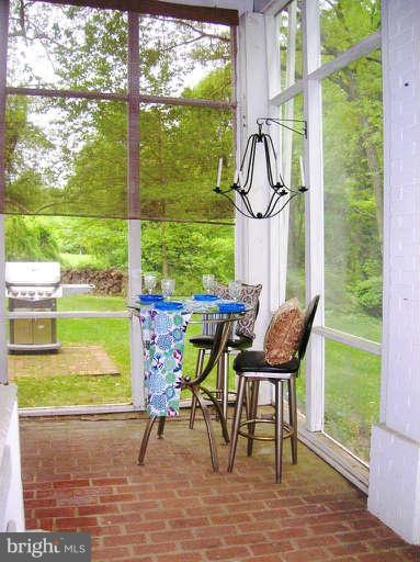 1708 Mansion Ridge Road Annapolis, MD 21401 - Photo 30 of 30 a view of a dining room with furniture window and outside view