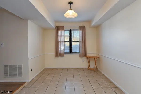 a view of an empty room with window