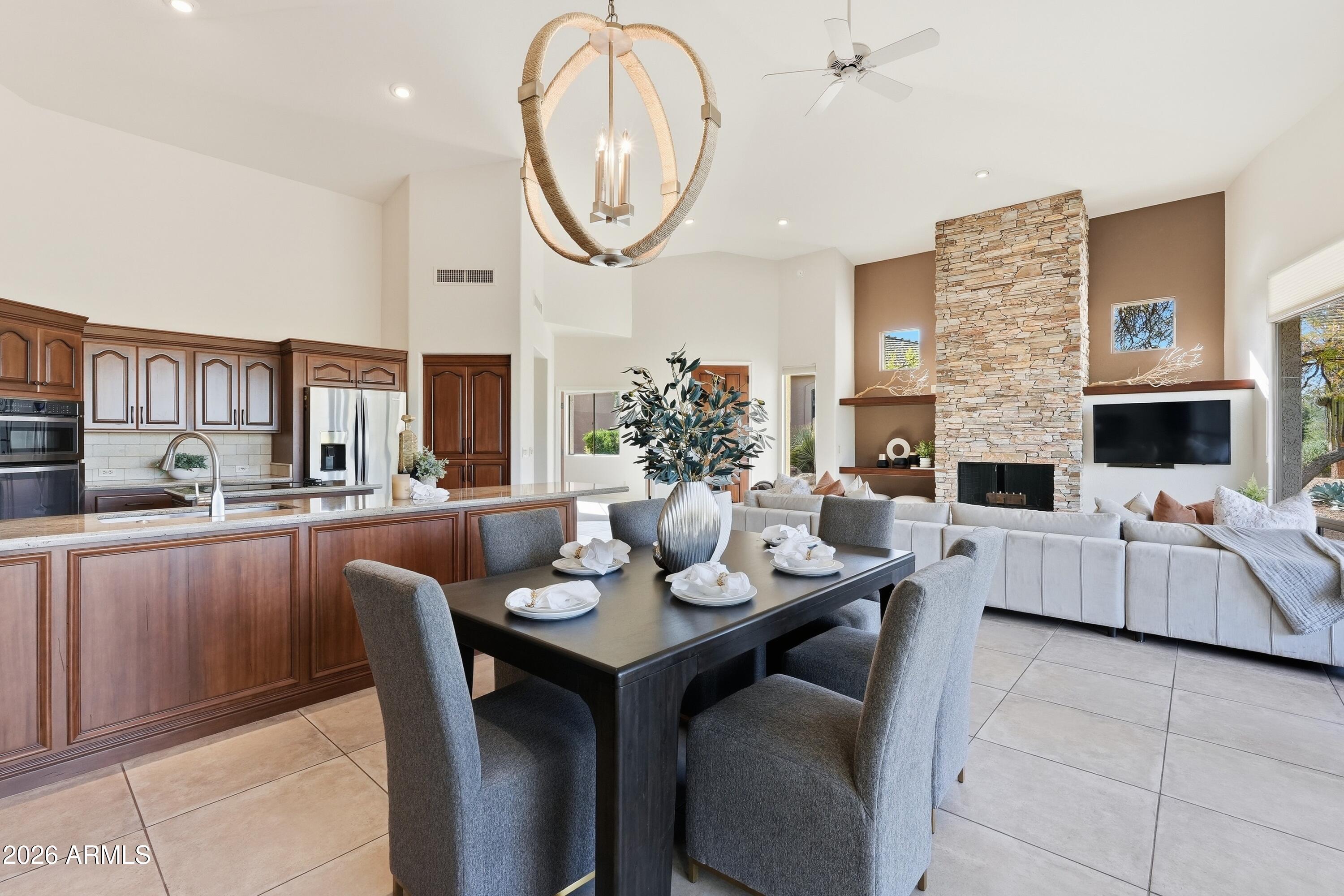 18602 Amarado Circle Rio Verde, AZ 85263 - Photo 13 of 58 a view of a dining room with furniture