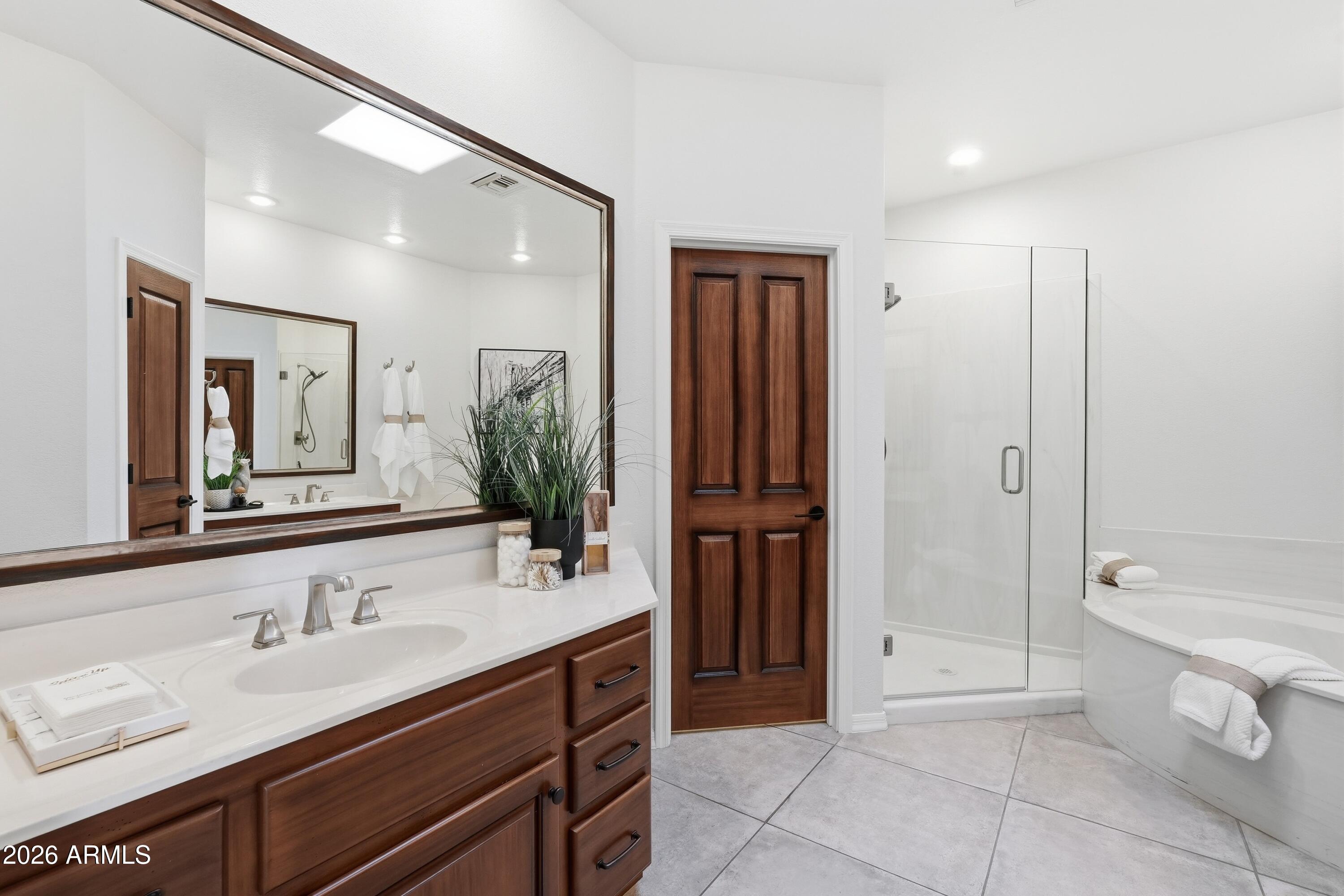 18602 Amarado Circle Rio Verde, AZ 85263 - Photo 21 of 58 a bathroom with a sink a toilet and shower