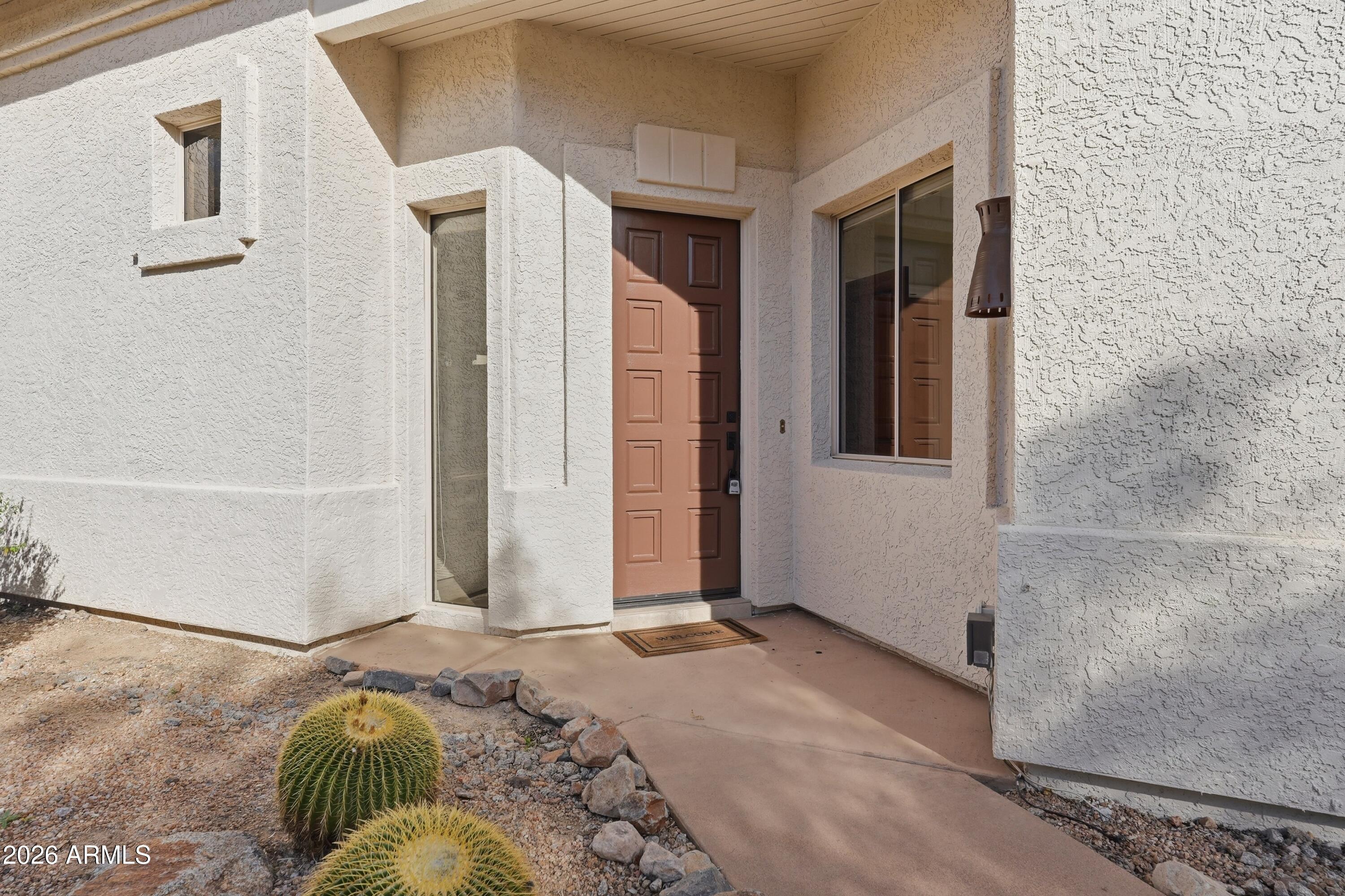 18602 Amarado Circle Rio Verde, AZ 85263 - Photo 41 of 58 a bedroom with a bed and a window