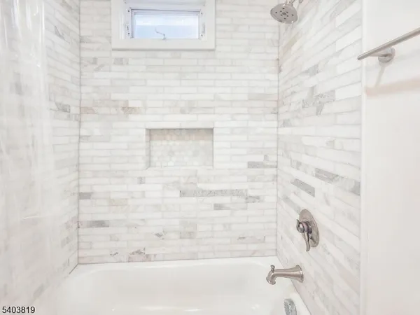 a bathroom with a bathtub