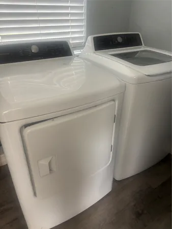 a utility room with dryer and washer