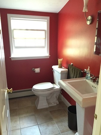 20 Blackman Road Canton, MA 02021 - Photo 6 of 8 a bathroom with a toilet sink and mirror