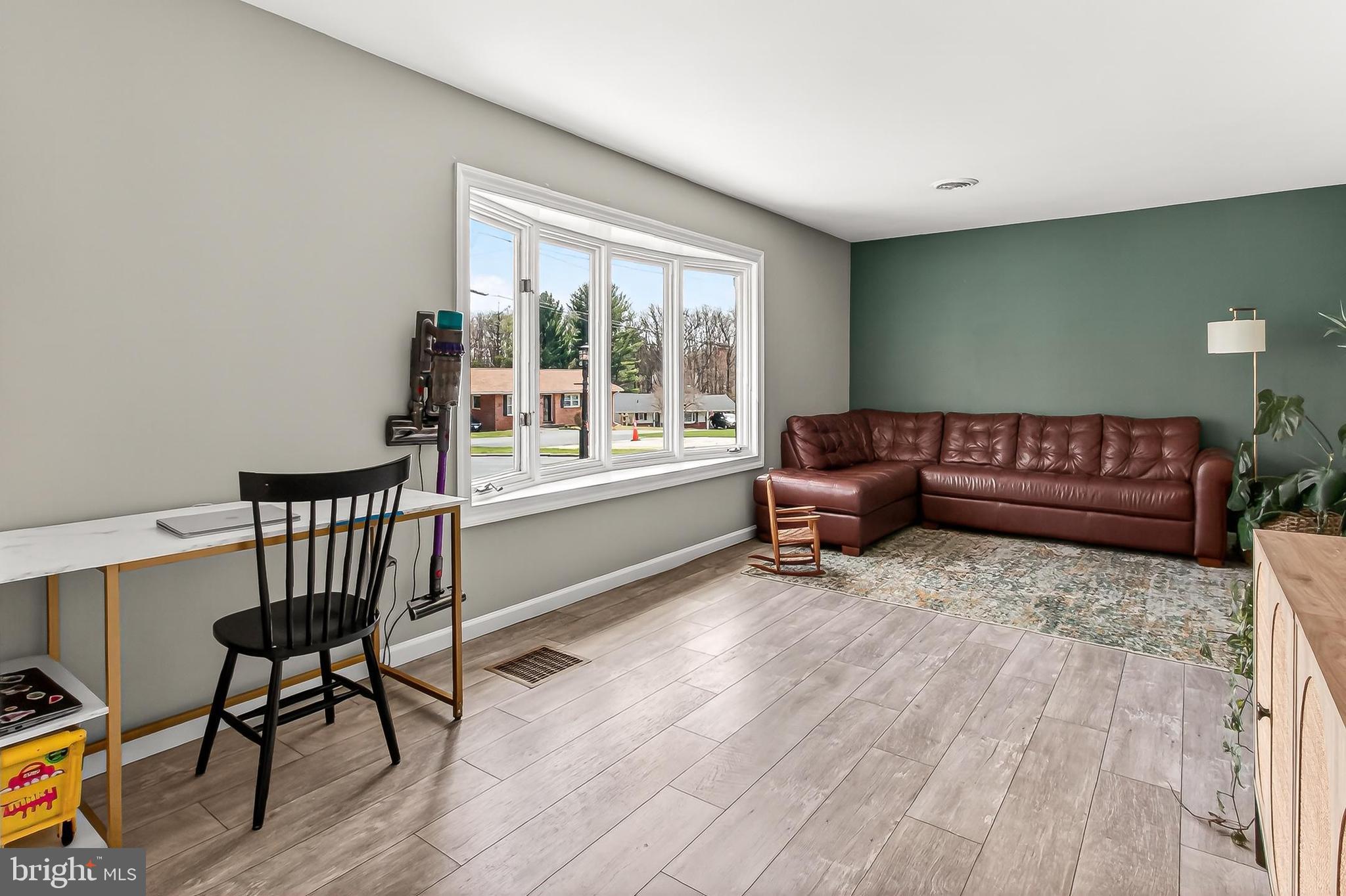7416 Downhill Run Frederick, MD 21702 - Photo 21 of 74 a living room with furniture and a window