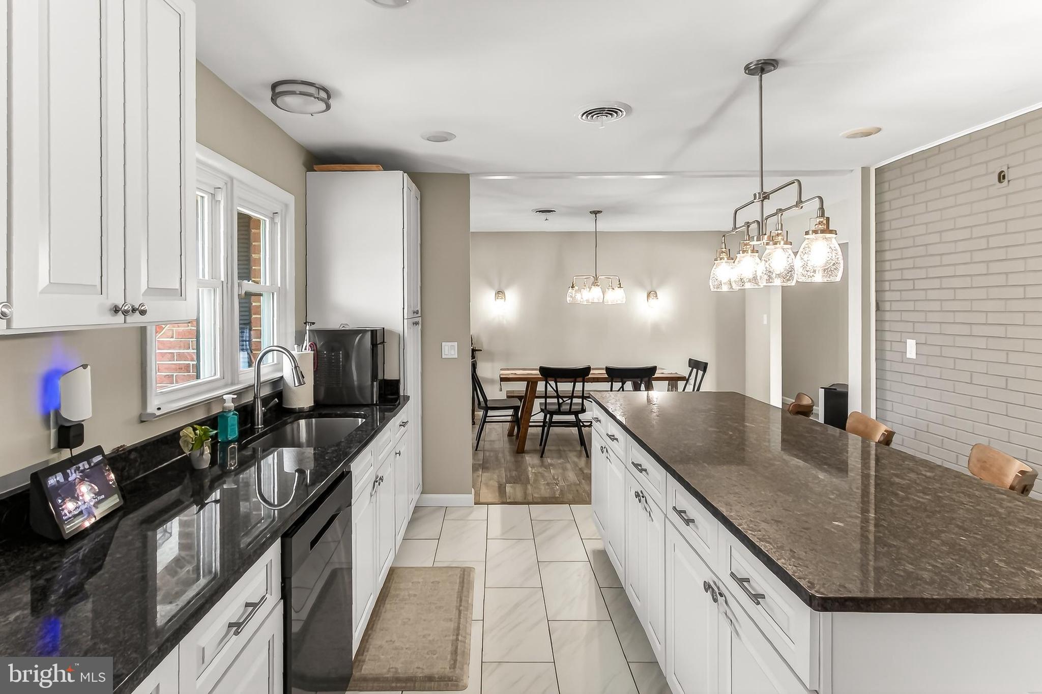 7416 Downhill Run Frederick, MD 21702 - Photo 32 of 74 a kitchen with granite countertop lots of counter top space