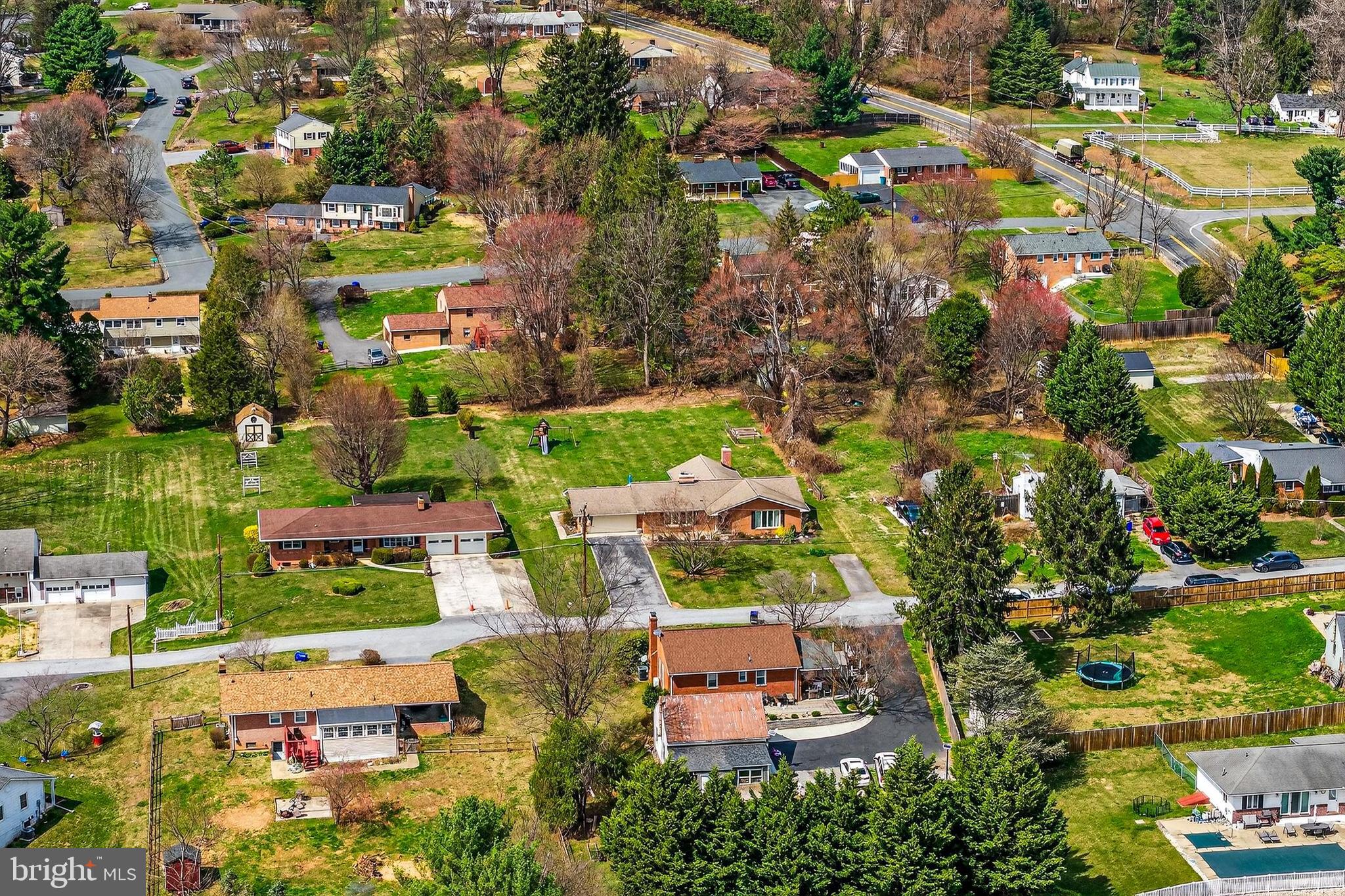 7416 Downhill Run Frederick, MD 21702 - Photo 4 of 74 an aerial view of residential houses with outdoor space and street view