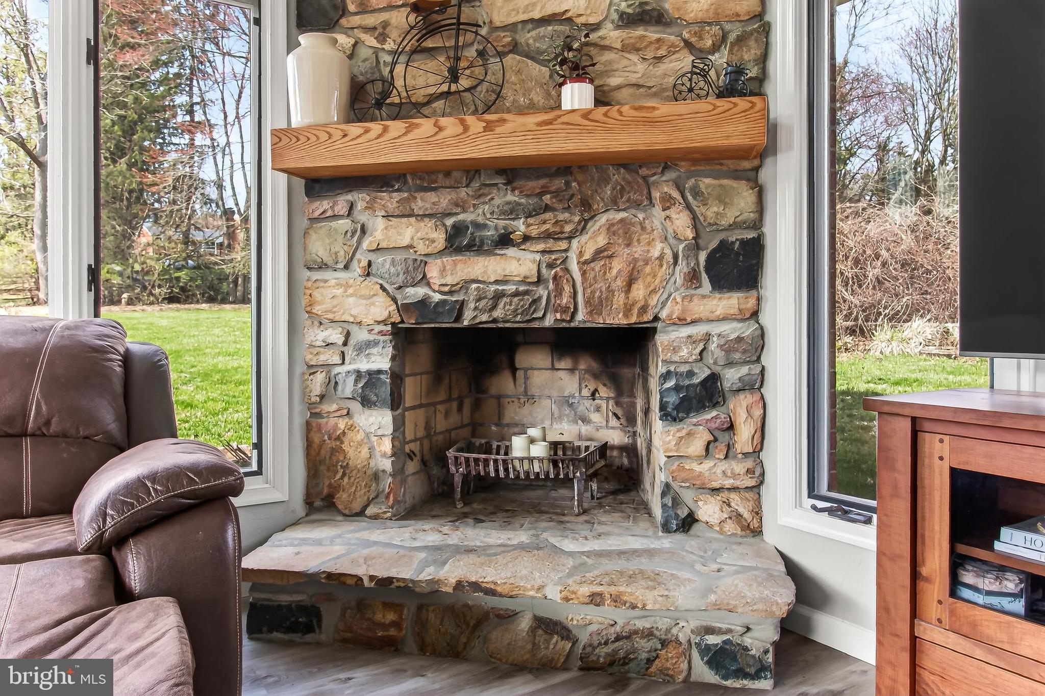 7416 Downhill Run Frederick, MD 21702 - Photo 41 of 74 a living room with furniture and a fireplace