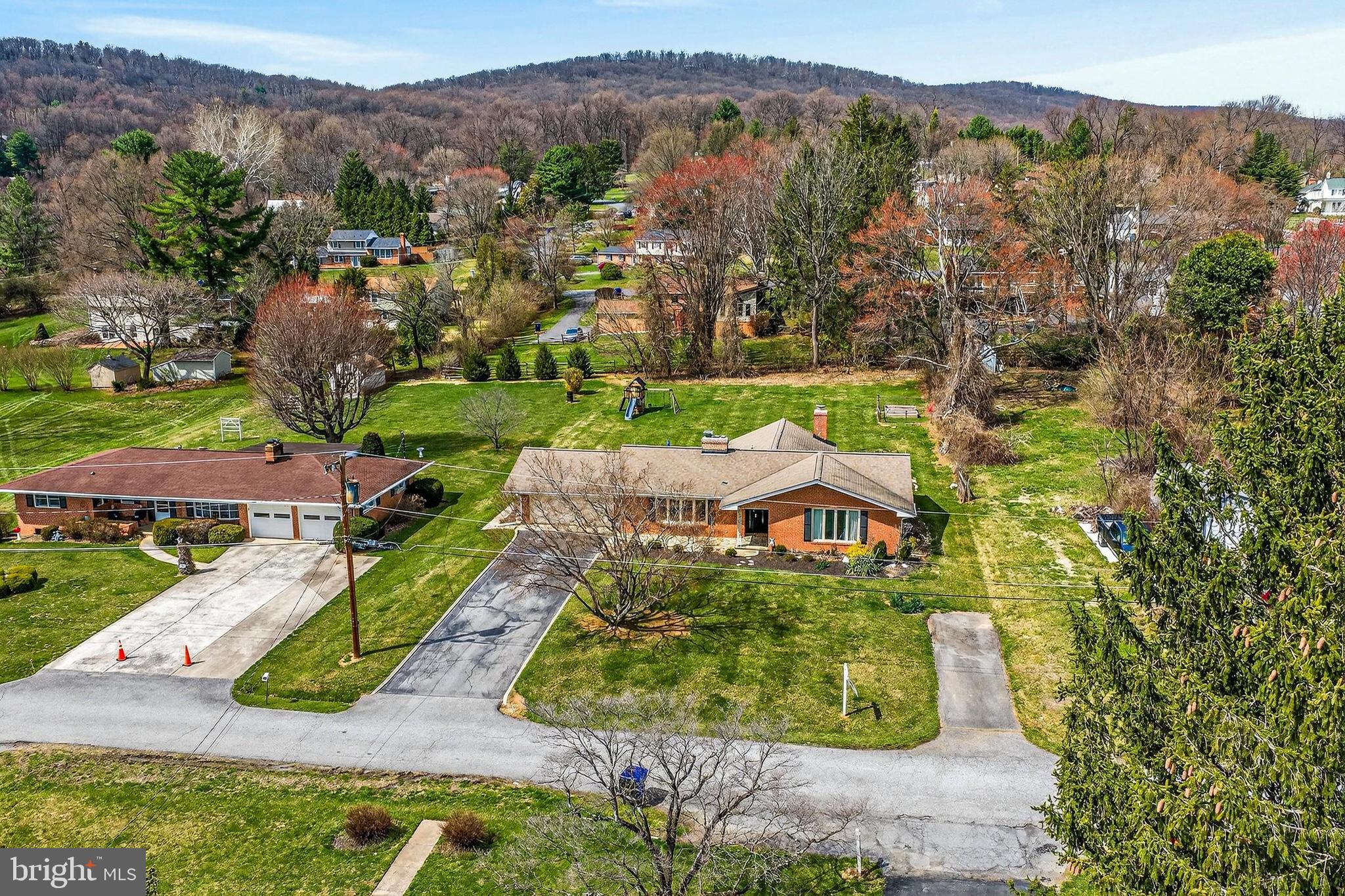 7416 Downhill Run Frederick, MD 21702 - Photo 7 of 74 an aerial view of a house with a garden
