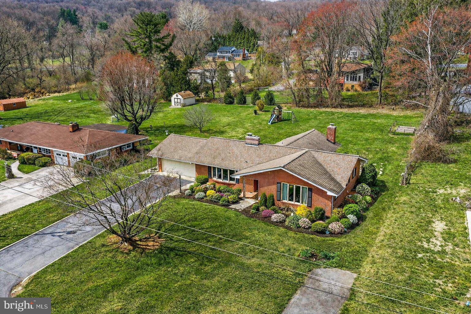 7416 Downhill Run Frederick, MD 21702 - Photo 9 of 74 a aerial view of a house with yard and green space