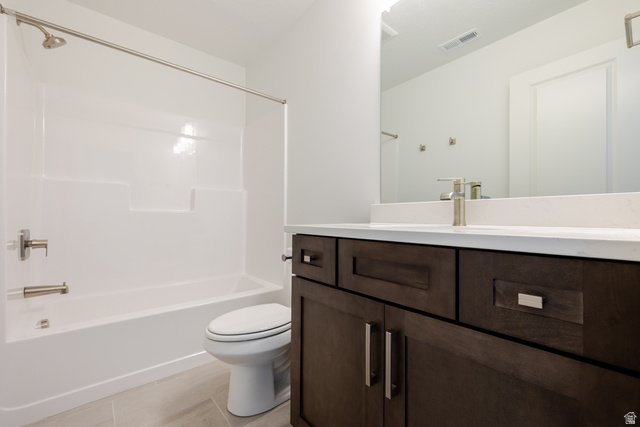 4748 Heartwood Road, Unit 434 Mapleton, UT 84664 - Photo 13 of 18 Full bath featuring vanity, bathing tub / shower combination, and light tile patterned floors