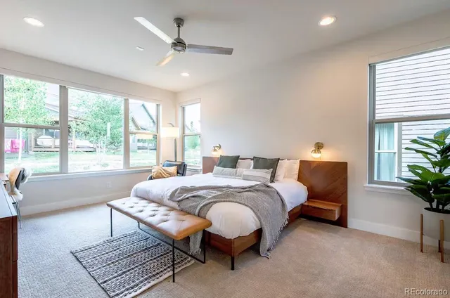 a bed room with a bed and a couch