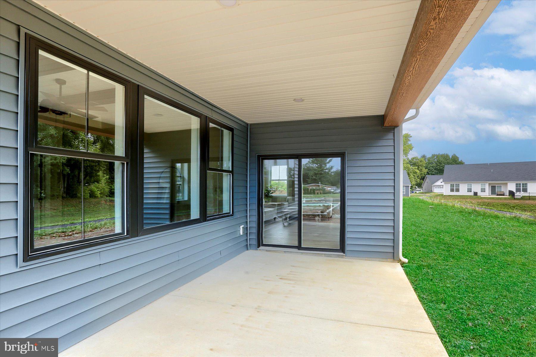 4118 Locust Road Camp Hill, PA 17011 - Photo 9 of 43 16x10 Covered Patio. Grass was digitally added.