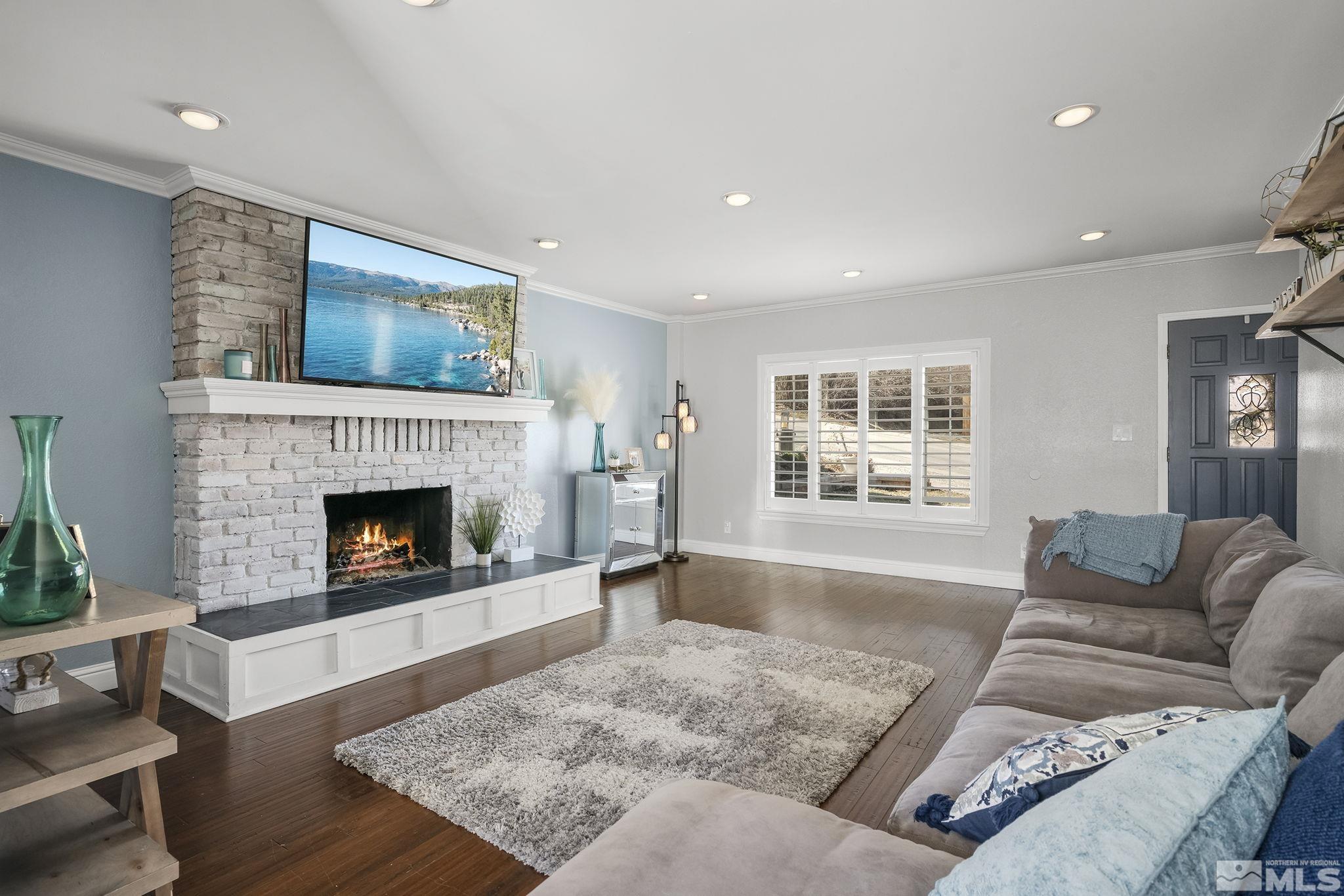 1102 Ferris Lane Reno, NV 89509 - Photo 6 of 19 a living room with furniture and a fireplace