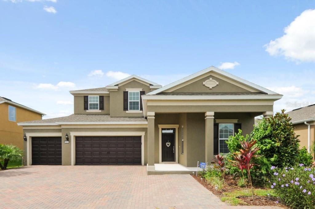 13230 Overstreet Road Windermere, FL 34786 - Photo 1 of 1 a front view of a house with yard