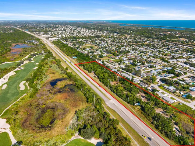 a view of a city with an ocean