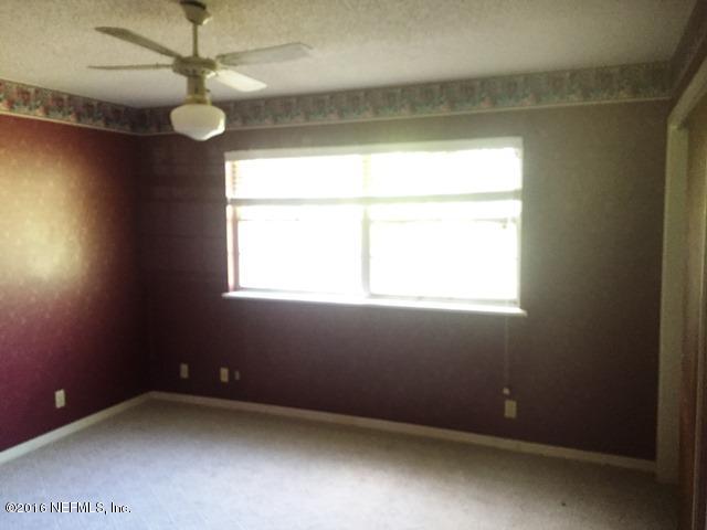 4155 Pinto Road Middleburg, FL 32068 - Photo 15 of 38 a view of an empty room with a window