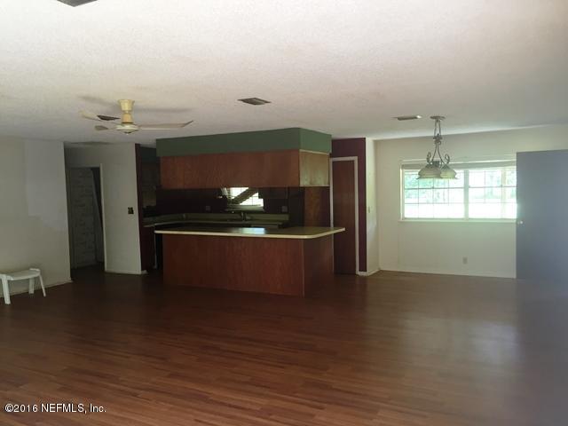 4155 Pinto Road Middleburg, FL 32068 - Photo 2 of 38 a view of room with window and stainless steel appliances