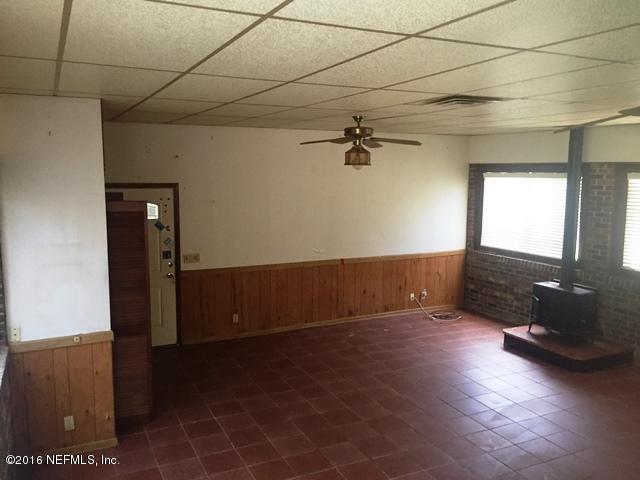 4155 Pinto Road Middleburg, FL 32068 - Photo 4 of 38 a view of empty room with windows