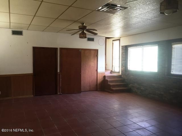4155 Pinto Road Middleburg, FL 32068 - Photo 5 of 38 a view of empty room with windows