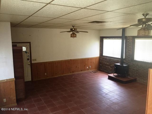 4155 Pinto Road Middleburg, FL 32068 - Photo 6 of 38 a view of a room with window and a ceiling fan