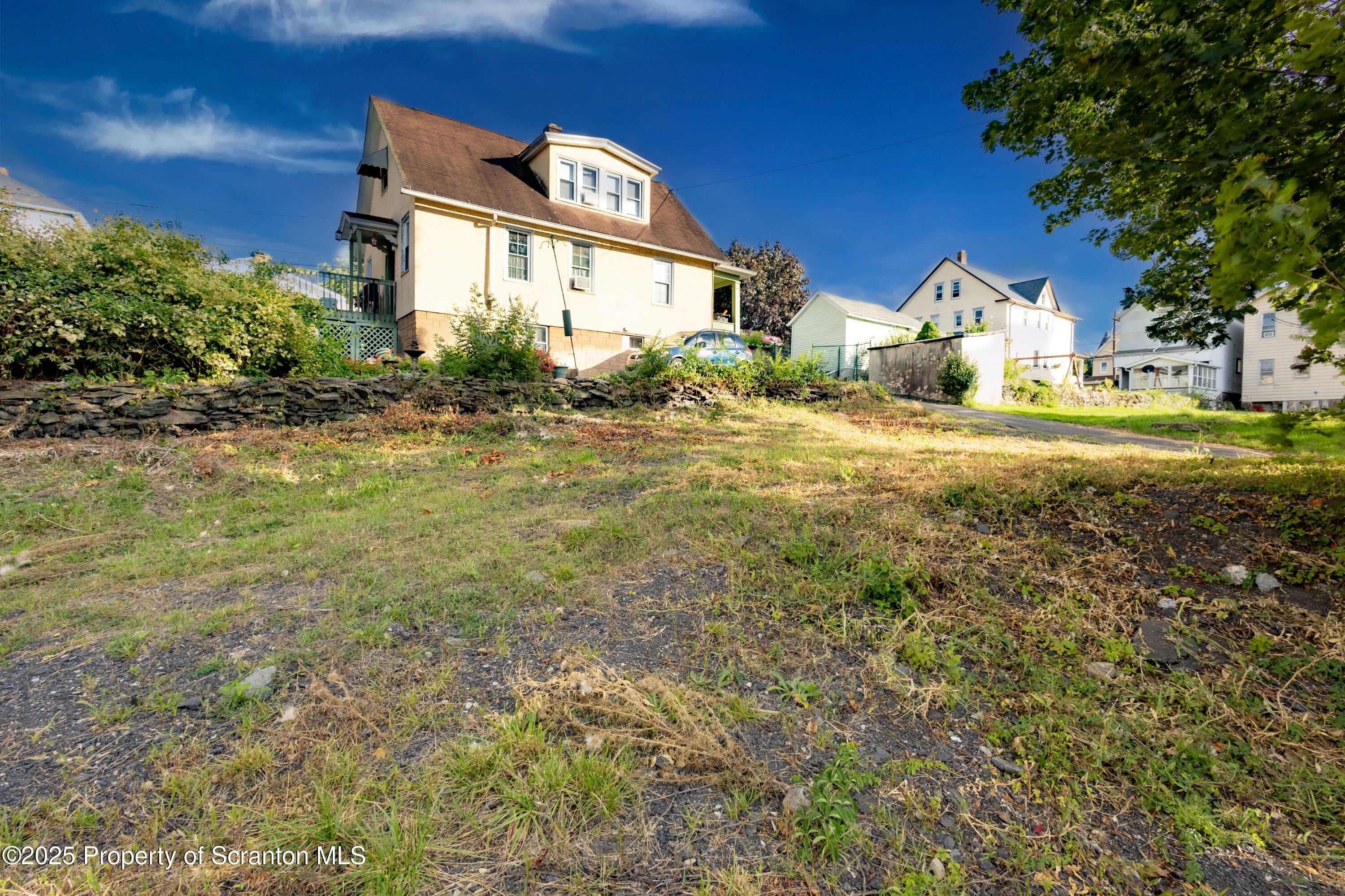 728 Alder Street Scranton, PA 18505 - Photo 4 of 13 a view of a house with a outdoor space