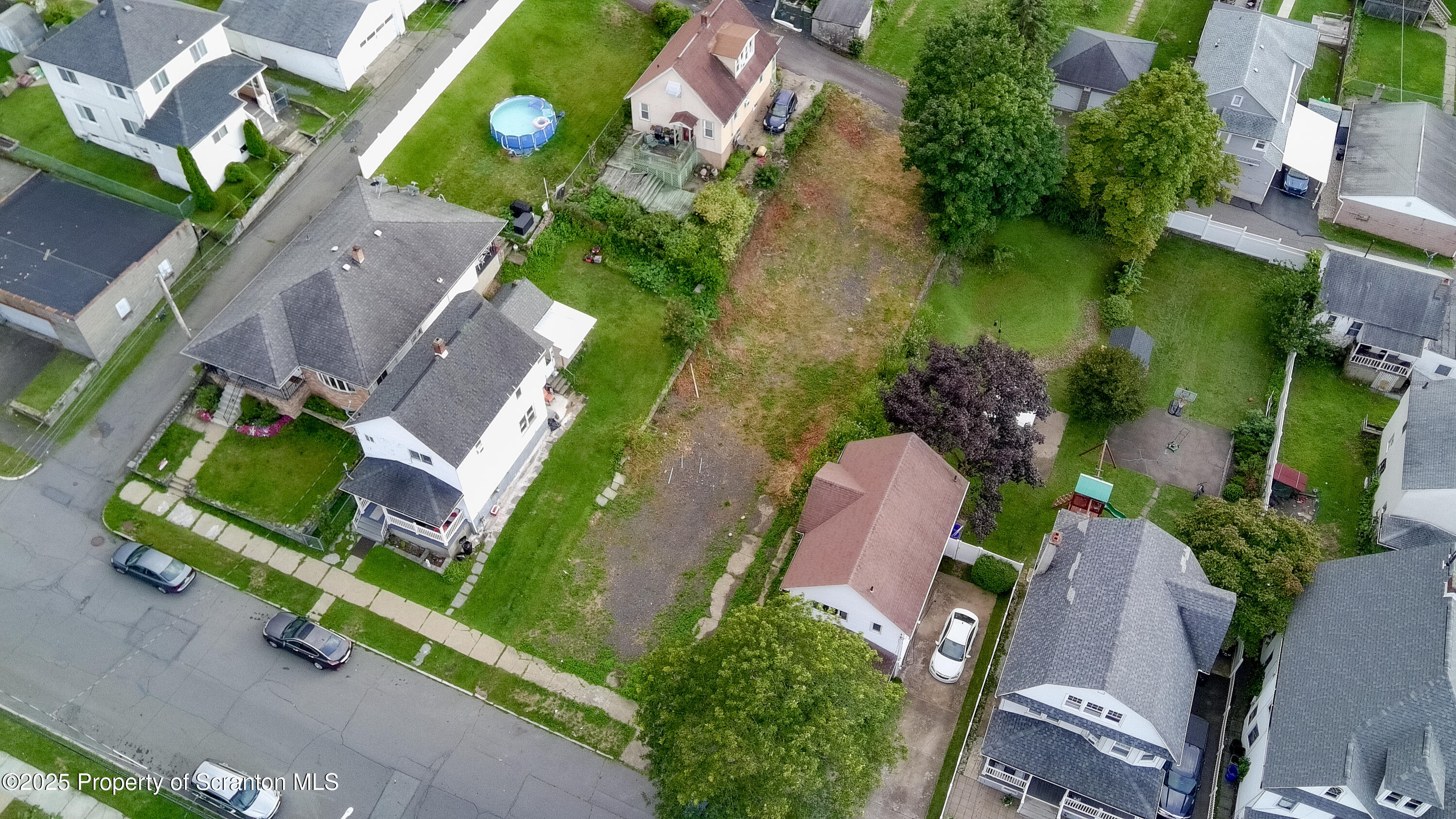 728 Alder Street Scranton, PA 18505 - Photo 9 of 13 an aerial view of a house with outdoor space and lake view