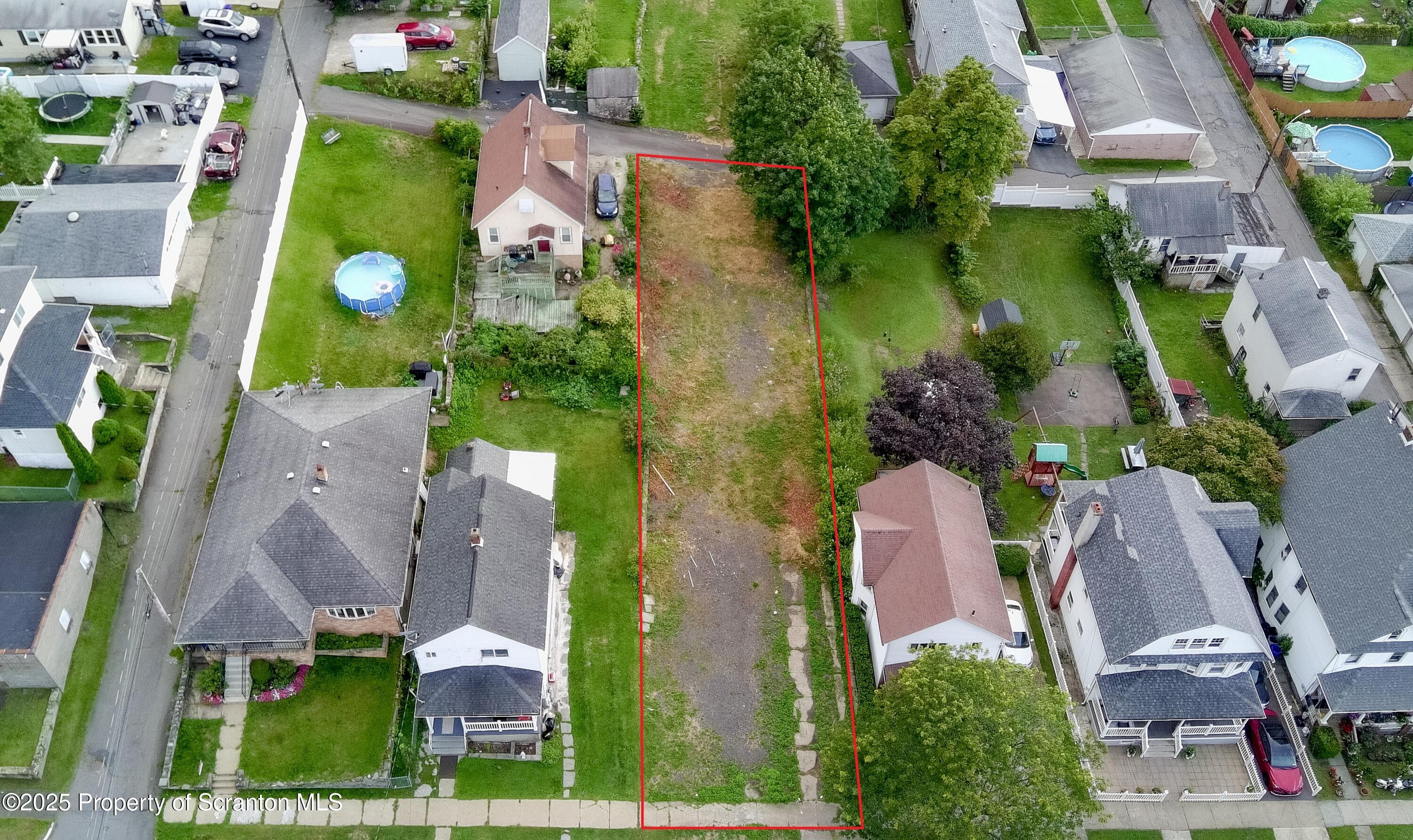 728 Alder Street Scranton, PA 18505 - Photo 10 of 13 an aerial view of multiple houses with yard