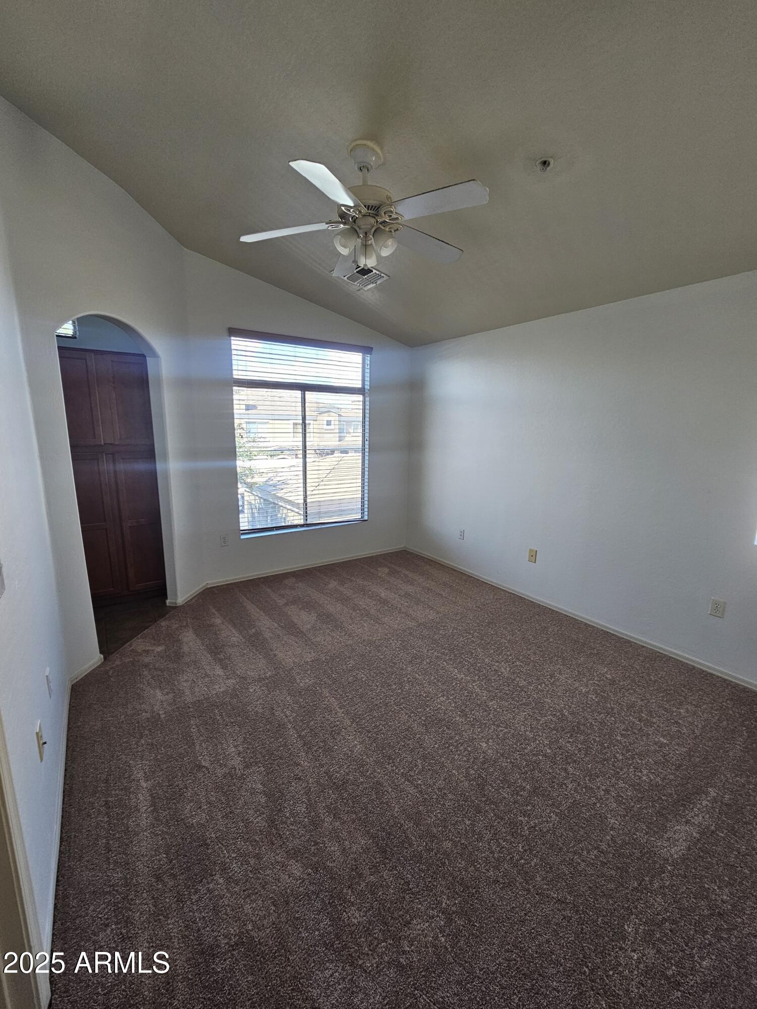 2024 South Baldwin, Unit 52 Mesa, AZ 85209 - Photo 8 of 8 an empty room with windows and fan