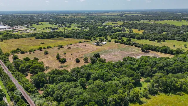 an aerial view of a city with lots of residential buildings