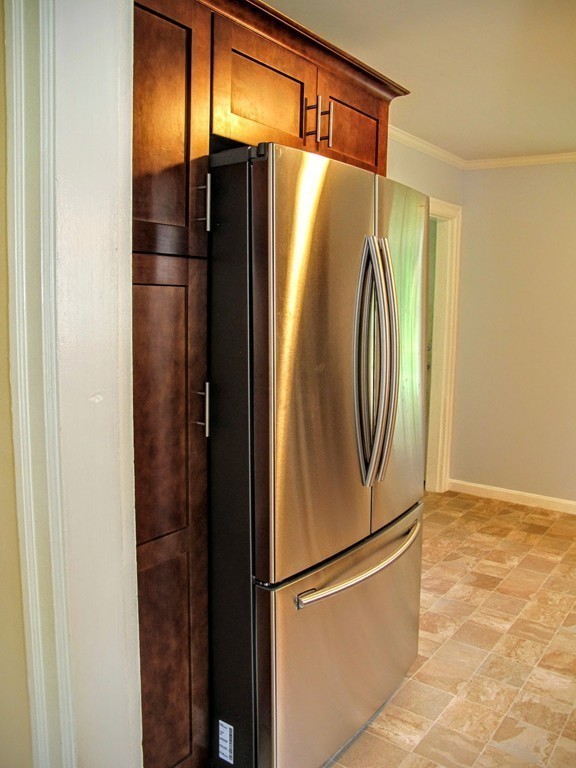 56 Plumtree Road Sunderland, MA 01375 - Photo 12 of 29 a metallic refrigerator freezer sitting in a kitchen