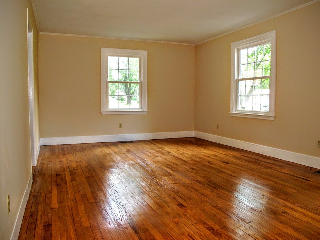 56 Plumtree Road Sunderland, MA 01375 - Photo 13 of 29 a view of an empty room with wooden floor and a window