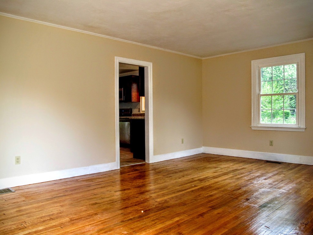 56 Plumtree Road Sunderland, MA 01375 - Photo 14 of 29 a view of an empty room with wooden floor and a window